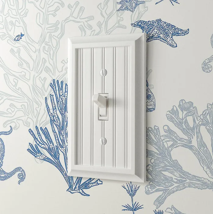 Amerelle decorative wall plates in a beautifully designed room