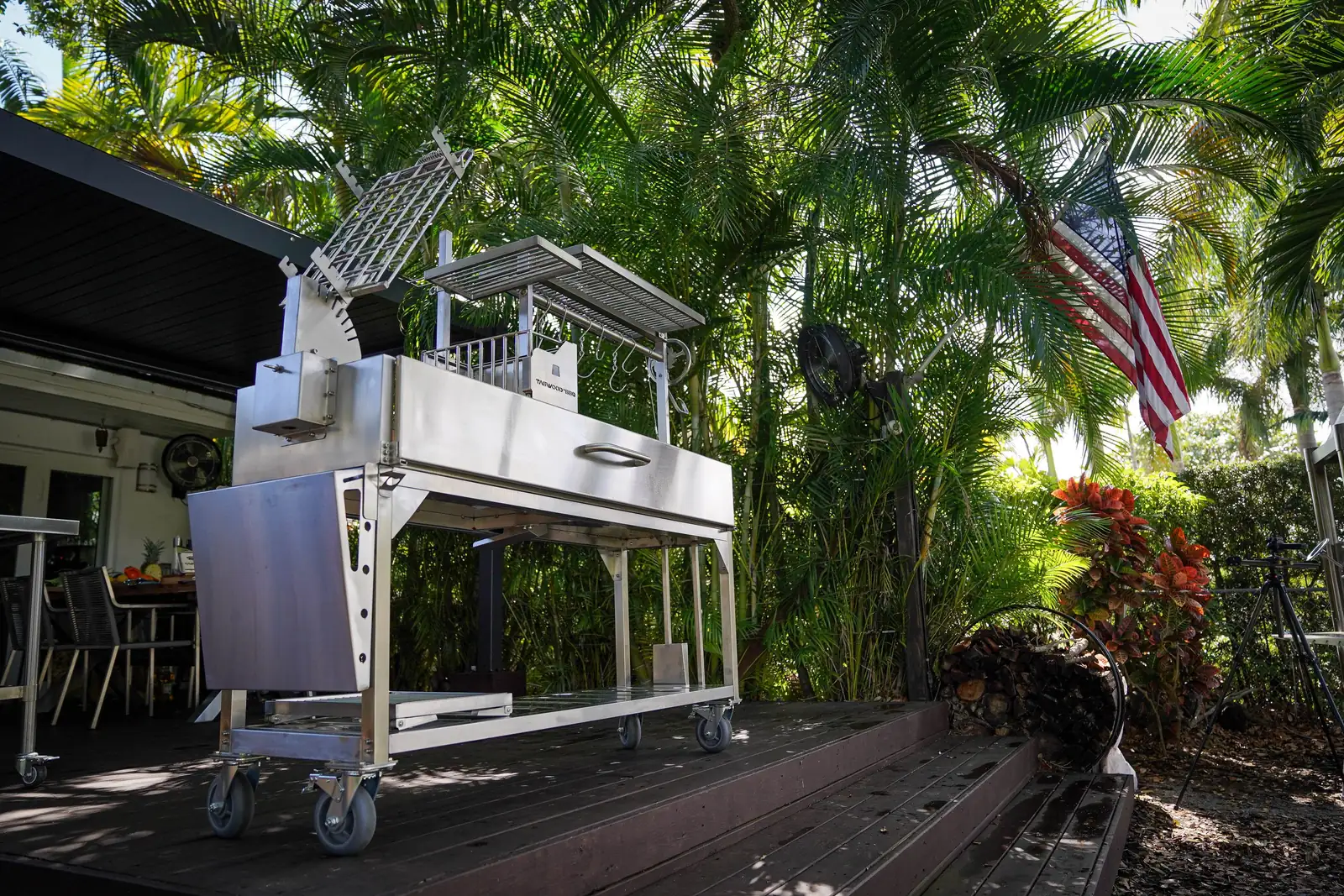 Tagwood BBQ06SS freestanding grill under palm trees