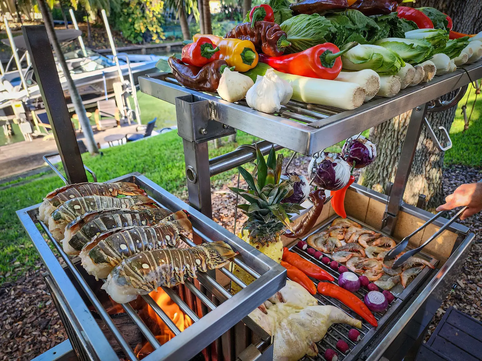 Vegetables and skewers grilling on a Tagwood clamp grill